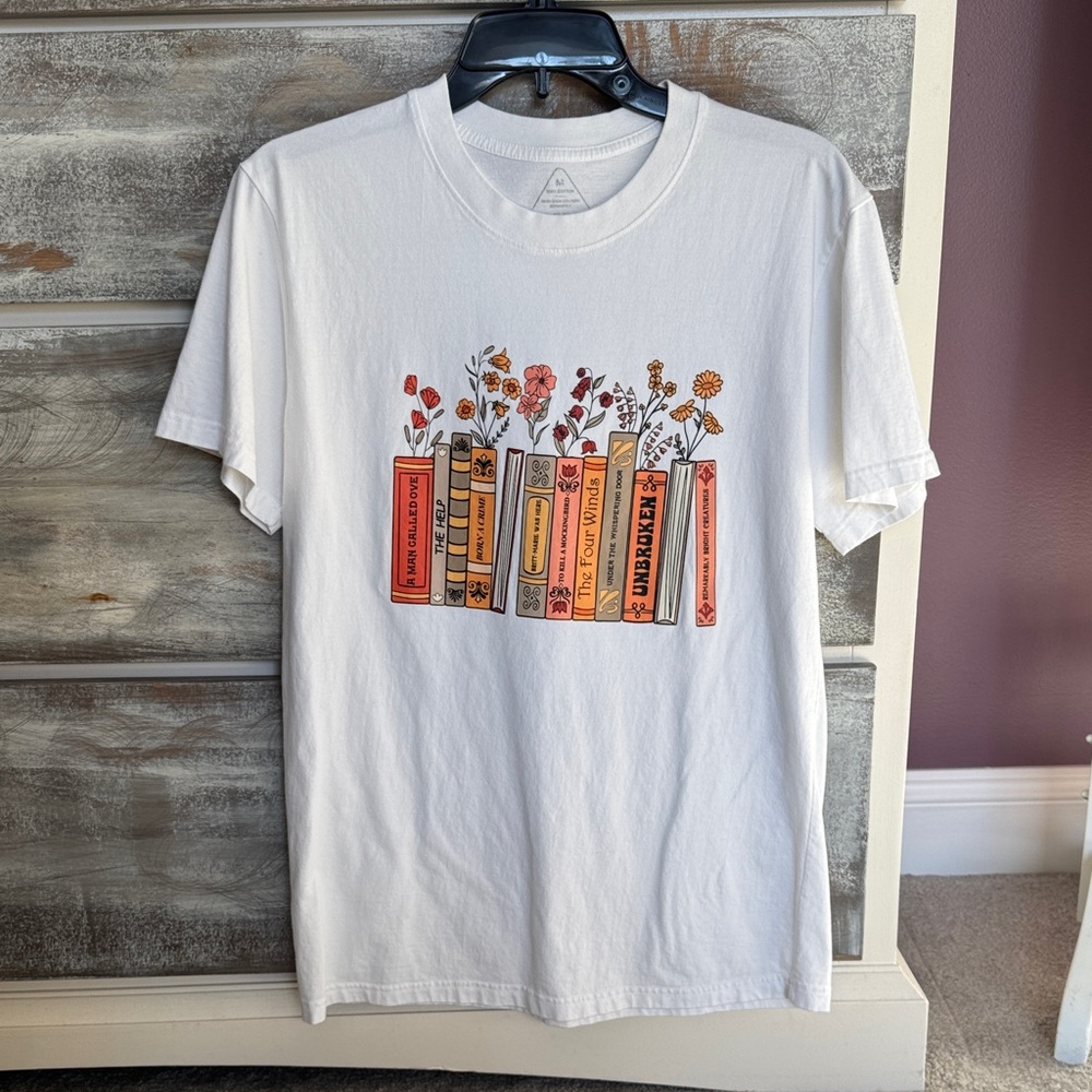 White Graphic T-Shirt with Book and Flower Design